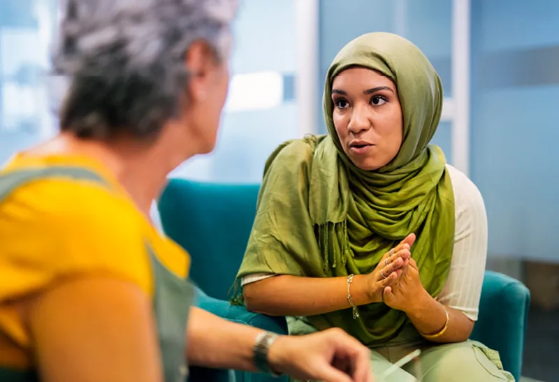A female interpreter talks to a customer